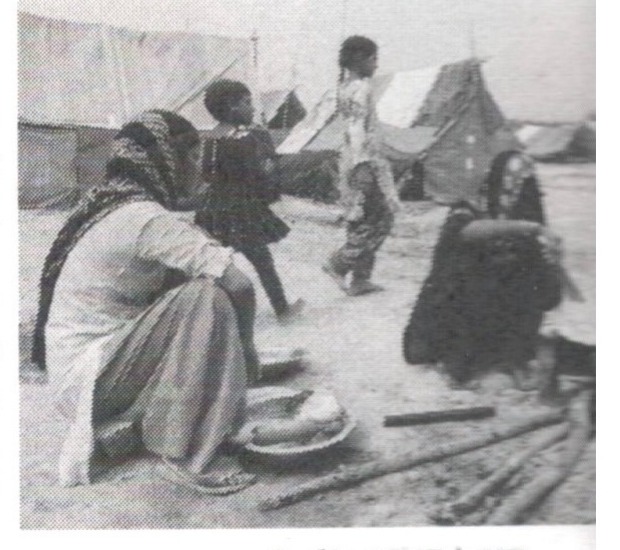 Families and children in a temporary settlement